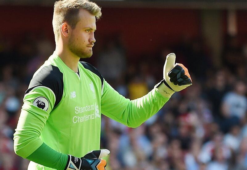 Liverpool keeper Simon Mignolet after saving a penalty against Arsenal’s Theo Walcott during the Premier League match between Arsenal and Liverpool at the Emirates Stadium in London, Britain, 14 August 2016. Andy Rain / EPA