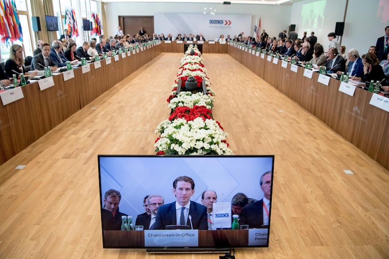 Austrian foreign and OCSE chairperson-in-office minister Sebastian Kurz is seen on a TV screen as he addresses the participants of the Informal Organization for Security and Co-operation in Europe (OSCE) foreign ministers' meeting in Mauerbach, Austria.  EPA/Christian Bruna