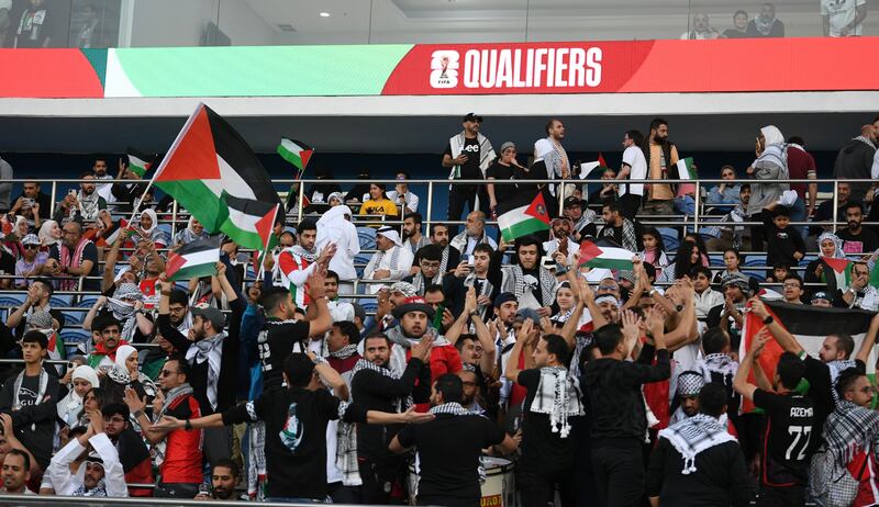 Supporters of the Palestine team during the 2026 World Cup qualifier against Australia in Kuwait. EPA