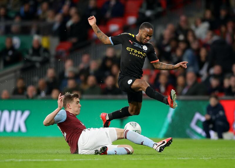 Manchester City's Raheem Sterling rides a challenge from Aston Villa's Bjorn Engels. Reuters