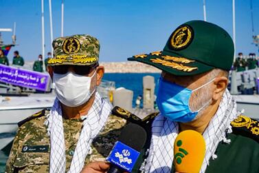 Iran's Revolutionary Guard Corps commander Major General Hossein Salami, right, accompanied by the IRGC naval commander Rear Admiral Alireza Tangsiri, speaks to Iranian media during his visit to the island of Abu Musa on January 2, 2020. Iran's Revolutionary Guard via Sepahnews / AFP