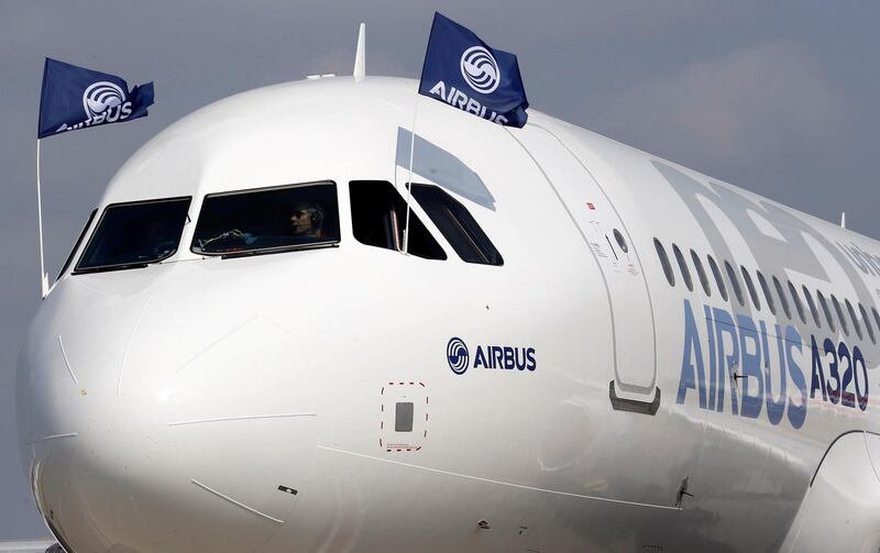 FILE PHOTO: Flight test engineers drive the Airbus A320neo (New Engine Option) after its first flight in Colomiers near Toulouse, southwestern France, September 25, 2014.  REUTERS/Regis Duvignau/File Photo