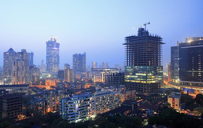 Construction activity in full swing at the Lower Parel neighborhood of Mumbai. India’s minimum built-up area requirement for FDI in construction has been lowered to 20,000 square metres from 50,000 sq metres. Subhash Sharma for The National