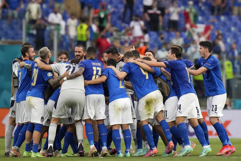 Italy players celebrate after winning the Euro 2020 Group A match against Wales. EPA