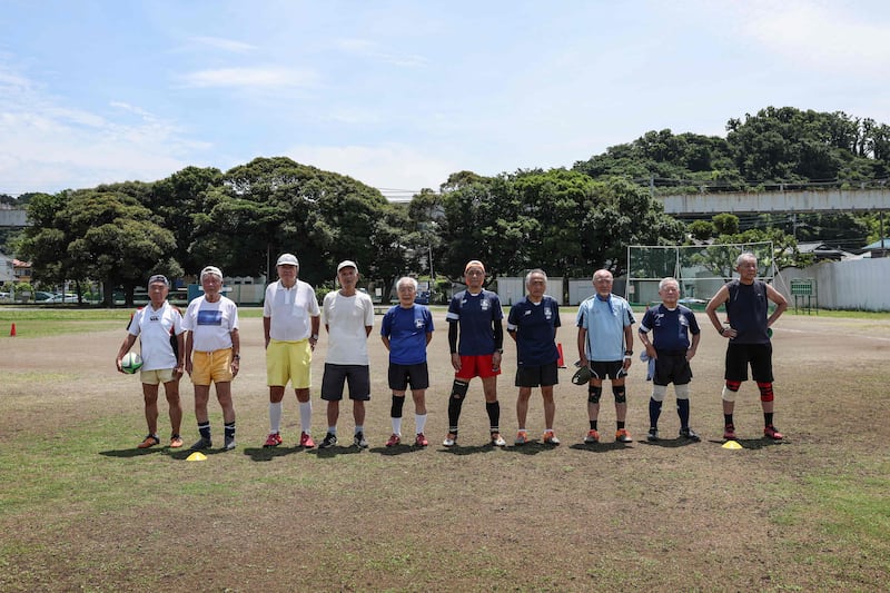 Yasutake Oshima, 85, second left, with teammates from the Fuwaku Rugby Club, which was created in 1979