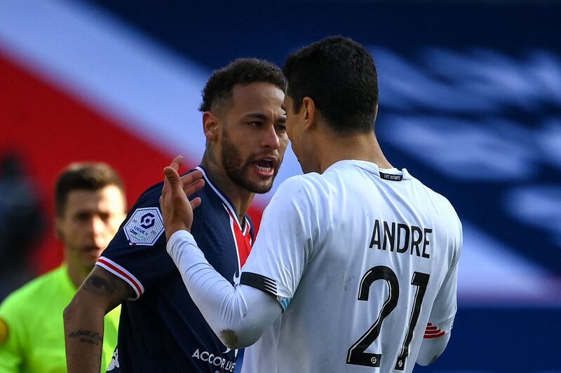 Neymar clashes with Lille's French midfielder Benjamin Andre during the Ligue 1 game. AFP