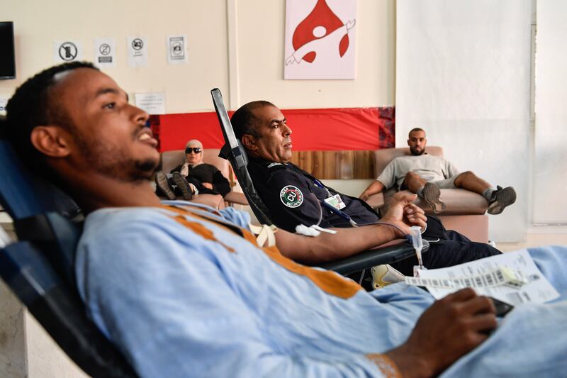 People make donations at a blood transfusion centre in Marrakesh after the powerful earthquake. EPA
