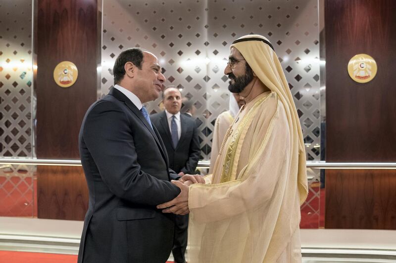 ABU DHABI, UNITED ARAB EMIRATES - February 06, 2018: HH Sheikh Mohamed bin Rashid Al Maktoum, Vice-President, Prime Minister of the UAE, Ruler of Dubai and Minister of Defence (R), greets HE Abdel Fattah El Sisi, President of Egypt (L), during a reception at the Presidential Airport.


( Mohamed Al Hammadi / Crown Prince Court - Abu Dhabi )
---