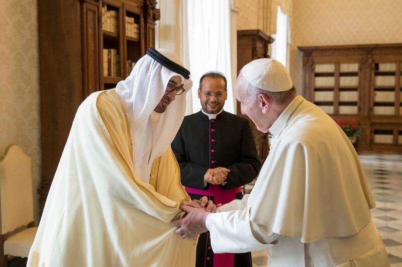 VATICAN CITY, VATICAN - September 15, 2016: HH Sheikh Mohamed bin Zayed Al Nahyan, Crown Prince of Abu Dhabi and Deputy Supreme Commander of the UAE Armed Forces (L), bids farewell to His Holiness Pope Francis, Bishop of Rome (R), after a meeting in the Papal Library at the Apostolic Palace. 
( Ryan Carter / Crown Prince Court - Abu Dhabi ) *** Local Caption ***  20160915RC_C164743.jpg