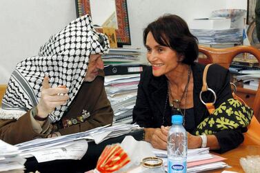 A file photo of Spanish Princess Maria Teresa of Bourbon meeting Palestinian leader Yasser Arafat in August 2004. AFP, HO file    