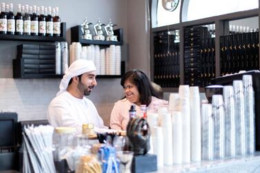 Ahmed Al Mulla and sister Amna are enjoying life as cafe owners in Sharjah. Reem Mohammed/The National