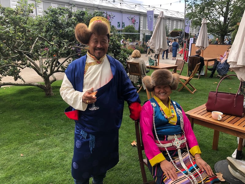 Visitors in traditional Himalayan dress at The Trailfinders 50th Anniversary Garden