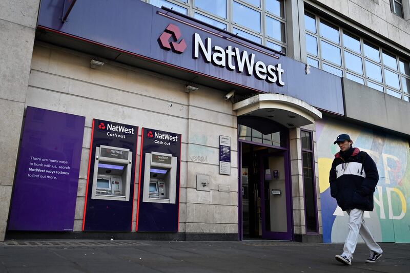 The NatWest Group has announced a final dividend of 10 pence a share and an £800 million share buyback. AFP