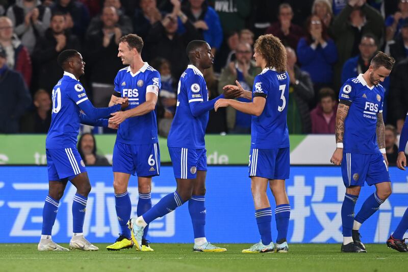 Patson Daka celebrates with teammates after scoring Leicester City's fourth goal. Getty