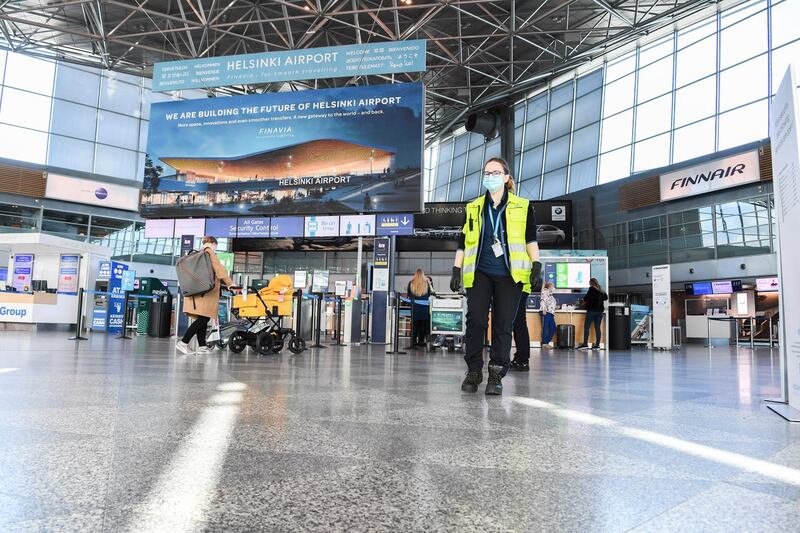 A general view of the departure hall at Helsinki-Vantaa airport in Vantaa, Finland following the easing of travel restrictions that allows visitors from Germany, Sweden and other low-risk countries to arrive in the country.  EPA