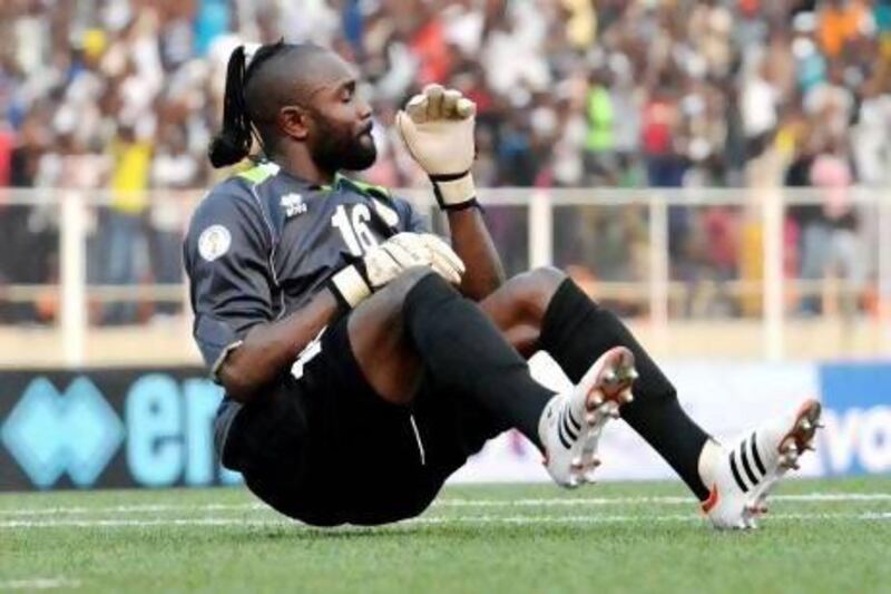 Democratic Republic of Congo goalkeeper Kidiaba Muteba celebrates as his team scored their second goal during their World Cup 2014 Africa Zone qualifying match against Togo in Kinshasa on June 10, 2012. Democratic Republic of Congo won 2-0. AFP PHOTO/JUNIOR D. KANNAH