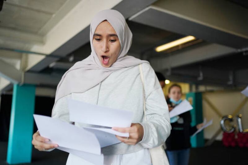 Amira Adrwish  opens her GCSE results at Core's City Academy in Birmingham, West Midlands.