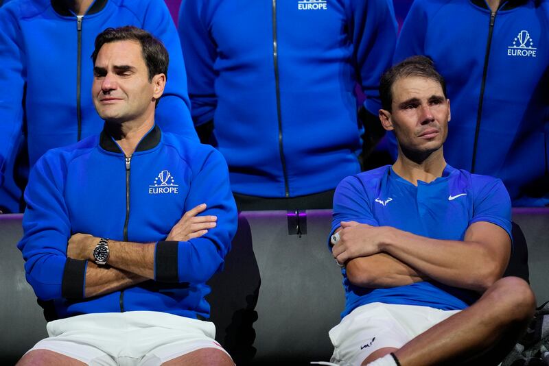 An emotional Roger Federer, left, of Team Europe sits alongside his playing partner Rafael Nadal after their Laver Cup doubles match against Team World's Jack Sock and Frances Tiafoe at the O2 Arena in London on Friday, September 23, 2022. AP