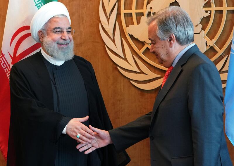 Iranian President Hassan Rouhani is greeted by UN Secretary General António Guterres at the United Nations.  AFP