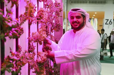 DUBAI, UNITED ARAB EMIRATES , Feb 19  – 2020 :- Abdula Aziz Al Mulla, Co Founder and CEO , Madar Farms at his stand at the Gulfood held at Dubai World Trade Centre in Dubai. (Pawan  Singh / The National) For  POAN. Story by Sophia Vahanvaty   
