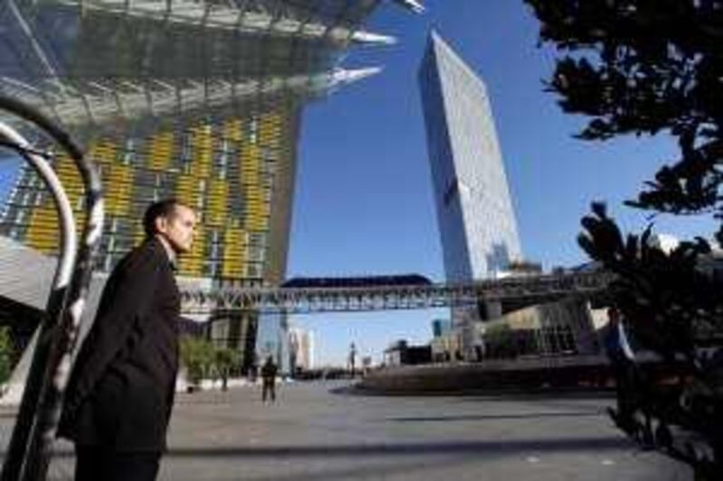Bellman Ronald Suarez stands ready at the Aria hotel-casino, the centerpiece of the $8.5 billion CityCenter project in Las Vegas, Nevada December 14, 2009. Aria opens to the public December 16. The CityCenter development is a partnership between MGM Mirage and Dubai World. REUTERS/Las Vegas Sun/Steve Marcus (UNITED STATES - Tags: BUSINESS) *** Local Caption ***  LAV02_USA-_1215_11.JPG *** Local Caption ***  LAV02_USA-_1215_11.JPG