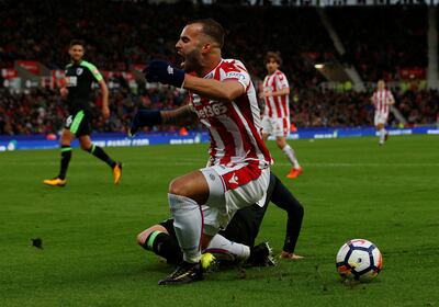 Soccer Football - Premier League - Stoke City vs AFC Bournemouth - bet365 Stadium, Stoke-on-Trent, Britain - October 21, 2017   Stoke City's Jese is challenged by Bournemouth's Adam Smith and subsequently appeals for a penalty   Action Images via Reuters/Craig Brough    EDITORIAL USE ONLY. No use with unauthorized audio, video, data, fixture lists, club/league logos or "live" services. Online in-match use limited to 75 images, no video emulation. No use in betting, games or single club/league/player publications. Please contact your account representative for further details.