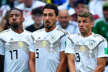 Thomas Muller, right, Jerome Boateng, left, and Mats Hummels, centre, will not be considered for selection by Germany manager Joachim Low. AFP