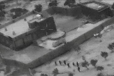 U.S. special forces move towards the compound of Islamic State leader Abu Bakr al-Baghdadi during a raid in the Idlib region of Syria in a still image from video October 26, 2019. Video picture taken October 26, 2019. U.S. Department of Defense/Handout via REUTERS. THIS IMAGE HAS BEEN SUPPLIED BY A THIRD PARTY. TPX IMAGES OF THE DAY