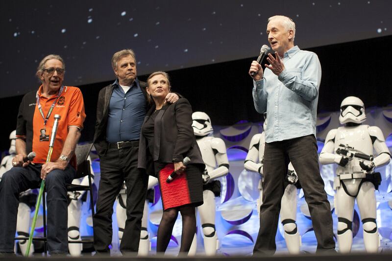 Original "Star Wars" cast members Peter Mayhew (L), Mark Hamill, Carrie Fisher and Anthony Daniels (R) appear at the kick-off event of the Star Wars Celebration convention in Anaheim, California, April 16, 2015. Reuters