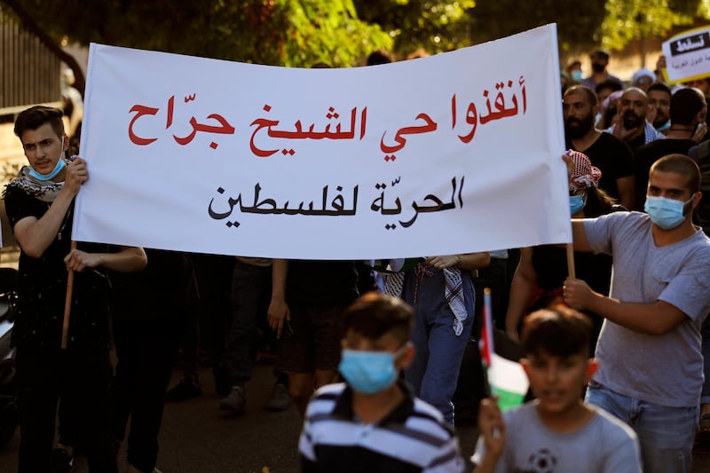 Demonstrators carry a banner that reads: "Save the Sheikh Jarrah neighbourhood, Freedom for Palestine," at a protest in Beirut, Lebanon. Palestinian residents of Sheikh Jarrah, in East Jerusalem, face eviction. AP Photo