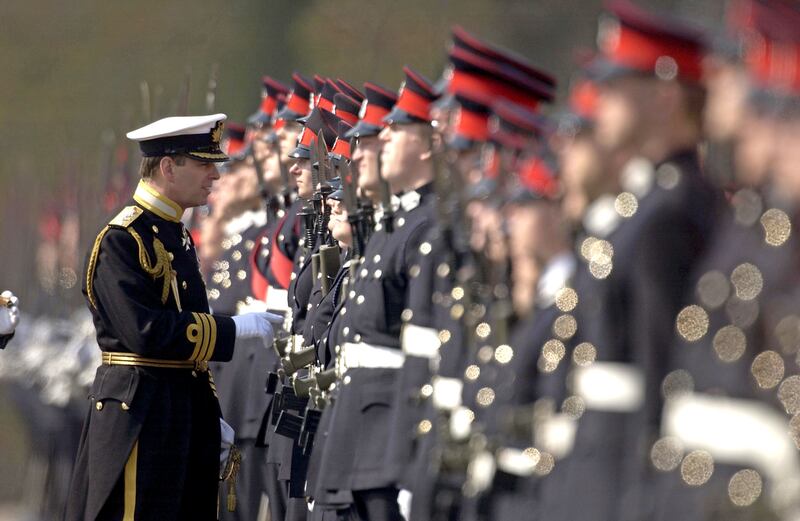 Prince Andrew inspects the parade at The Royal Military Academy in Sandhurst, in 2002, during the 138th Sovereign's Parade.