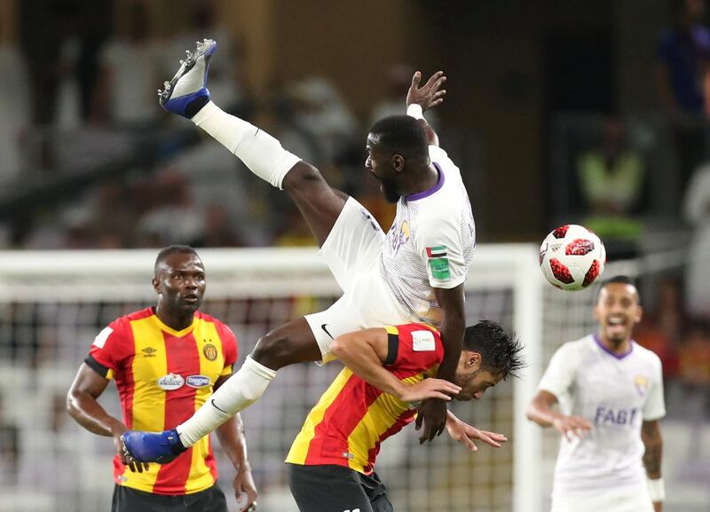 ES Tunis' Mohamed Belaili in action with Al Ain's Ahmed Barman. Reuters