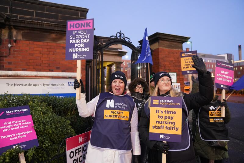 Nurses on strike outside Royal Victoria Infirmary in Newcastle. PA