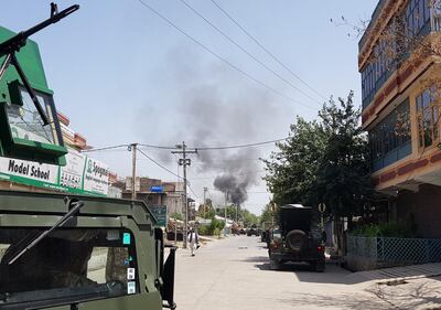 Smoke rises from an area where explosions and gunshots were heard, in Jalalabad city, Afghanistan July 28, 2018. REUTERS/Parwiz