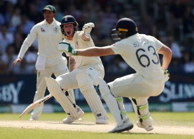 England's Ben Stokes yells at Jos Buttler before the latter is run out. AFP