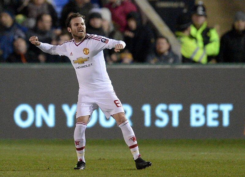 Manchester United's Spanish midfielder Juan Mata celebrates scoring his team's second goal during the English FA Cup fifth round football match between Shrewsbury Town and Manchester United at the Greenhous Meadow stadium in Shrewsbury, western England on February 22, 2016. RESTRICTED TO EDITORIAL USE. No use with unauthorized audio, video, data, fixture lists, club/league logos or 'live' services. Online in-match use limited to 75 images, no video emulation. No use in betting, games or single club/league/player publications.  / AFP / OLI SCARFF                           / RESTRICTED TO EDITORIAL USE. No use with unauthorized audio, video, data, fixture lists, club/league logos or 'live' services. Online in-match use limited to 75 images, no video emulation. No use in betting, games or single club/league/player publications.