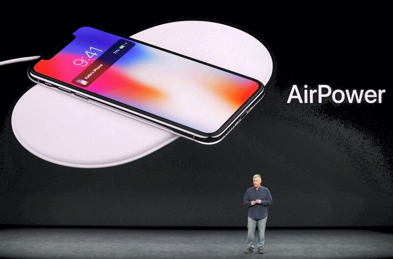 Apple Senior Vice President of Worldwide Marketing, Phil Schiller, shows the AirPower wireless charging mat during a launch event in Cupertino, California, U.S. September 12, 2017. REUTERS/Stephen Lam - HP1ED9C1I7WDC