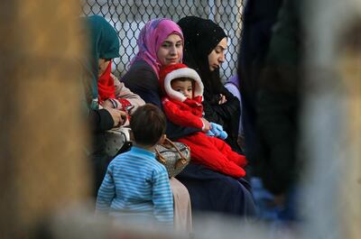 08 April 2019, Lebanon, Beirut: Syrian refugee women wait for the arrival of a bus that will take some Syrian refugees back to Syria. Hundreds of Syrian refugees in Lebanon are heading back to Syria. According to the UN refugee agency, Lebanon is hosting around a milion of registered Syrian refugees. Photo: Marwan Naamani/dpa (Photo by Marwan Naamani/picture alliance via Getty Images)