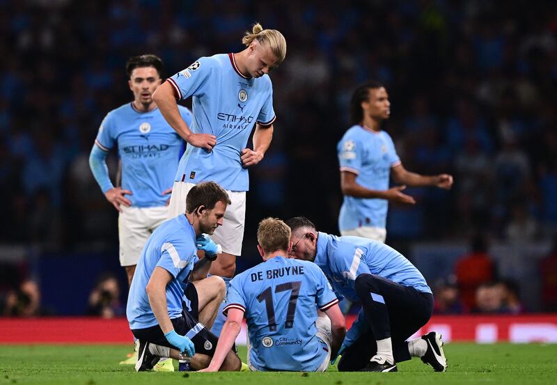 Manchester City midfielder Kevin De Bruyne receives treatment during the match. AFP