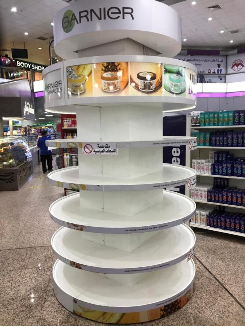 Empty shelves are seen where French products were displayed, after Kuwaiti supermarkets boycotted French goods, in Kuwait City. Reuters