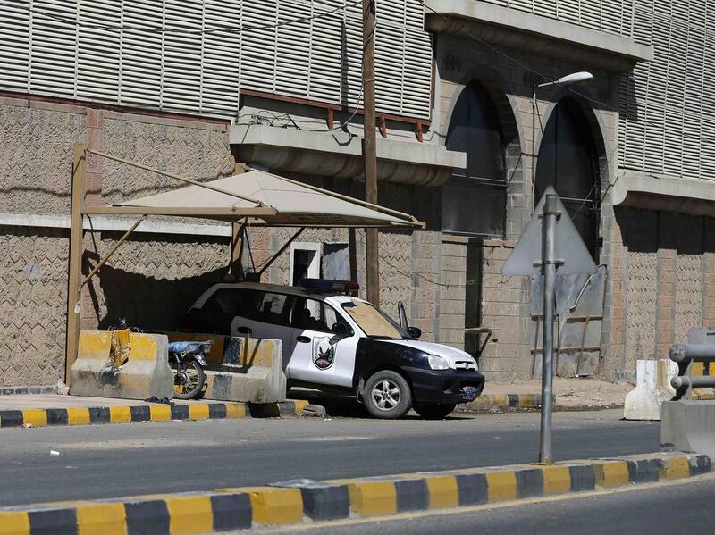 A police vehicle is positioned outside the UAE embassy after it was closed in Sanaa on February 14, 2015. Khaled Abdullah/Reuters