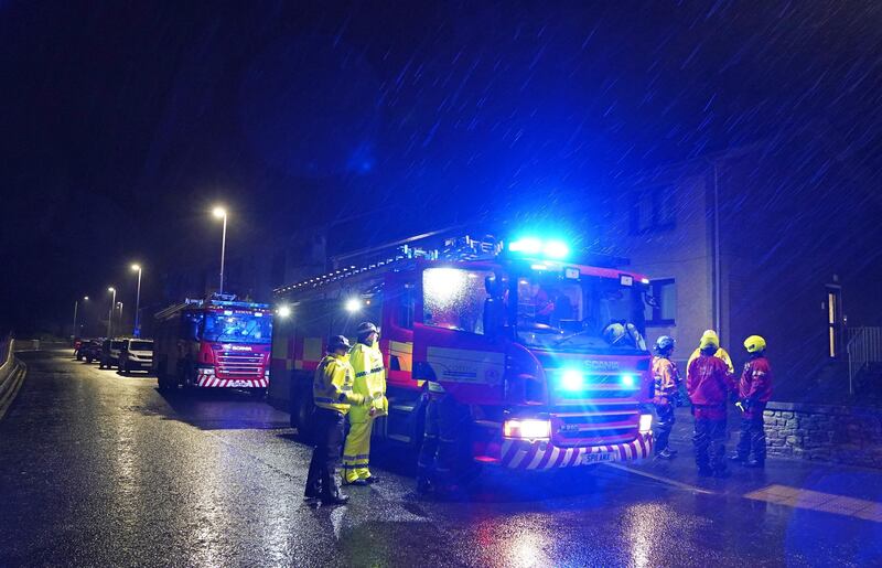 Emergency services in Brechin ask residents to leave their homes after flood warnings. PA
