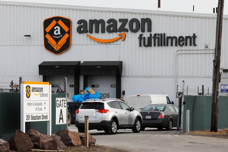 Signs mark the Amazon Fulfillment facility in Everett, Massachusetts, U.S., February 1, 2018.   REUTERS/Brian Snyder