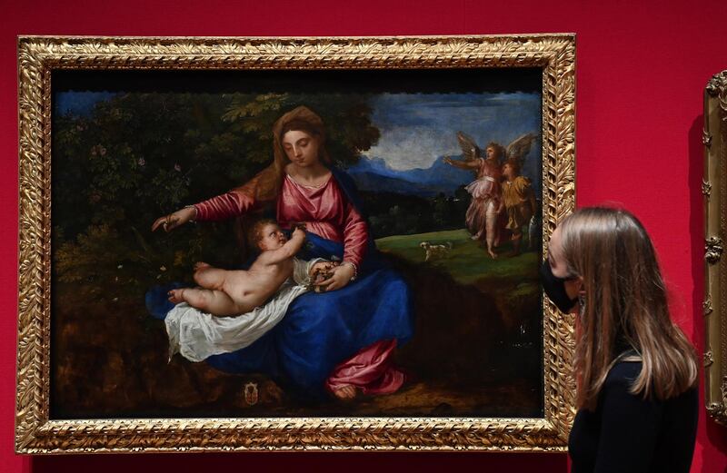 "Madonna and Child in a Landscape with Tobias and the Angel" by Italian master, Titian. EPA