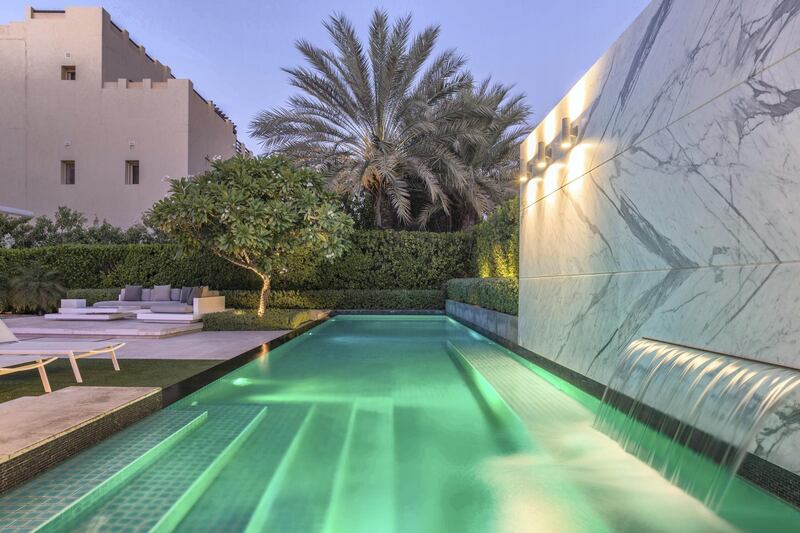 The property has a stunning pool area. Courtesy LuxuryProperty.com