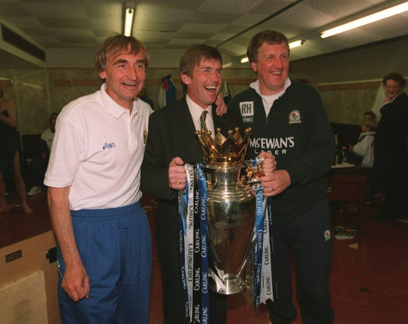 14 MAY 1994:  BLACKBURN MANAGER KENNY DALGLISH  AND HIS BACK ROOM TEAM, TONY PARKS (LEFT) AND RAY HARFORD, CELEBRATE WITH THE CUP AFTER WINNING THE FA CARLING PREMIERSHIP TROPHY DESPITE LOSING 1-2 TO LIVERPOOL AT ANFIELD. Mandatory Credit: Shaun Botterill/ALLSPORT