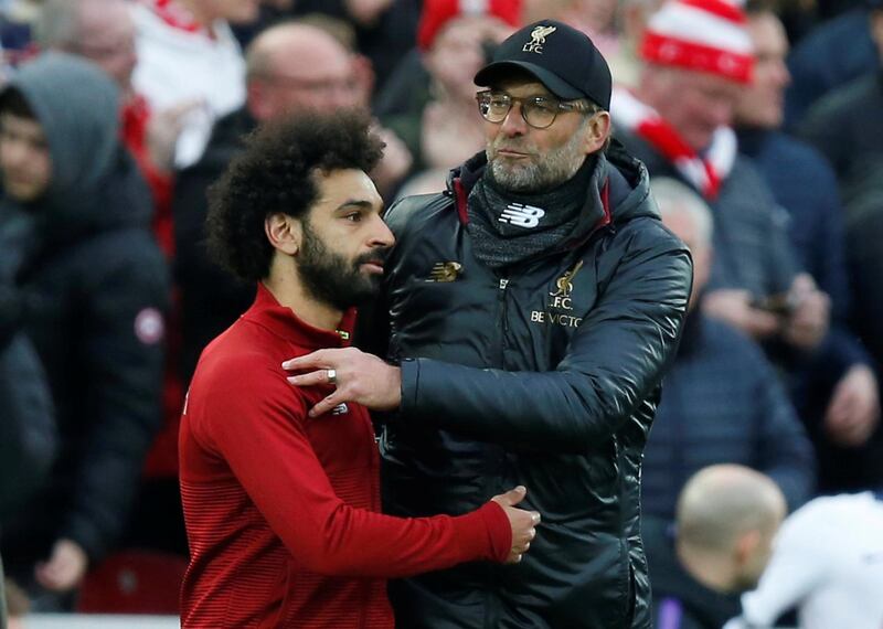 Soccer Football - Premier League - Liverpool v Tottenham Hotspur - Anfield, Liverpool, Britain - March 31, 2019  Liverpool manager Juergen Klopp and Liverpool's Mohamed Salah celebrate after the match                  REUTERS/Andrew Yates  EDITORIAL USE ONLY. No use with unauthorized audio, video, data, fixture lists, club/league logos or "live" services. Online in-match use limited to 75 images, no video emulation. No use in betting, games or single club/league/player publications.  Please contact your account representative for further details.