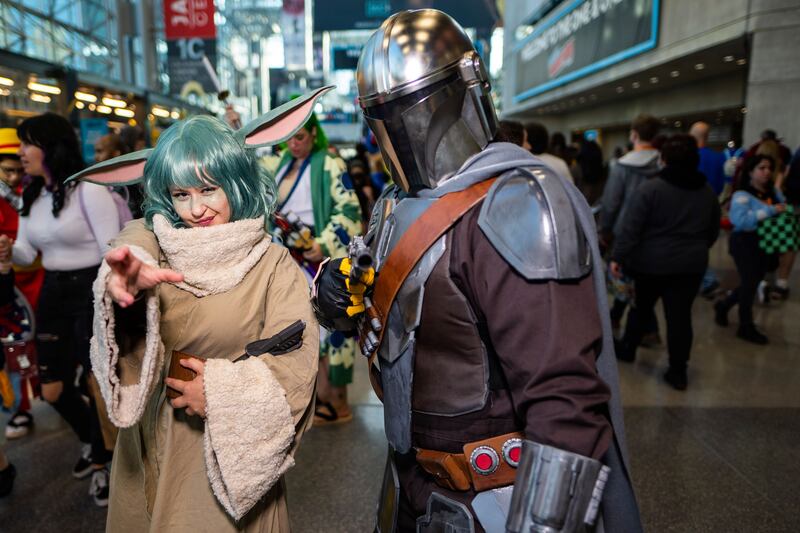 Grogu, left, and The Mandalorian. AP Photo