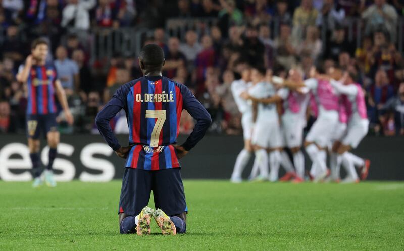 Barca's Ousmane Dembele watches after Inter Milan's Lautaro Martinez scored their second goal. Reuters