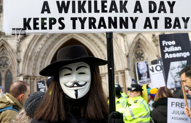 Supporters of WikiLeaks founder Julian Assange protest outside the High Court in London. Reuters
